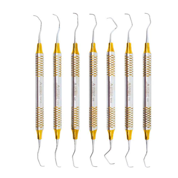 Full set of professional dental scalers and curettes with gold-plated tips and textured handles by Artman Instruments.
