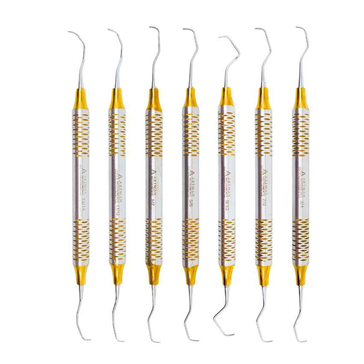 Full set of professional dental scalers and curettes with gold-plated tips and textured handles by Artman Instruments.
